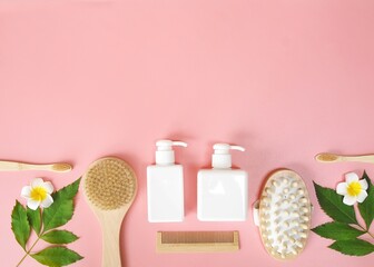 Fototapeta na wymiar Directly above view of spa products on pink background, Healthcare spa concept with copy space
