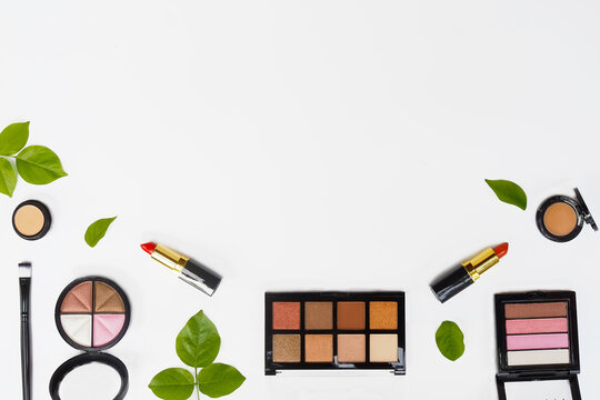 Flat lay composition with makeup cosmotic on white background