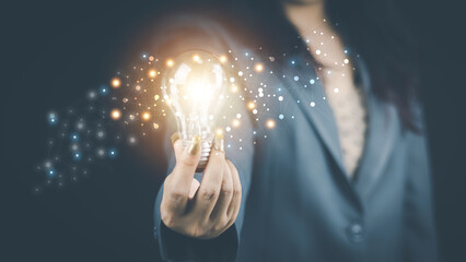 innovation technology concept womanHands holding light bulb for Concept new idea concept with innovation and inspiration,