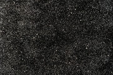 Black glitter sparkle background texture. Scattered abstract background for any celebration