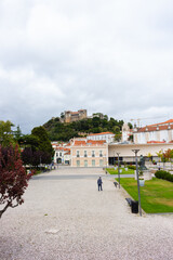 Leiria, Portugal, August 29, 2021: The Paulo VI Square, the Our Lady of the Immaculate Conception Cathedral and Leiria Castle..