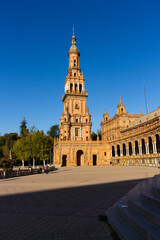 Fototapeta na wymiar Seville, Spain, September 11, 2021: The Spanish Steps in Seville or 'Plaza de España', where the main building of the Ibero-American Exhibition of 1929 was built. The North Tower.