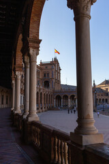 Obraz premium Seville, Spain, September 11, 2021: The Spanish Steps in Seville or 'Plaza de España', where the main building of the Ibero-American Exhibition of 1929 was built. The square of Plaza de Espana.