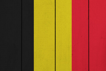 Patriotic wooden plank background in colors of flag. Belgium