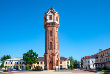Fototapeta na wymiar The old water tower on the city square. Staraya Russa, Russia
