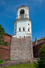 Ancient Clock Tower close-up. Vyborg, Russia, July, summer