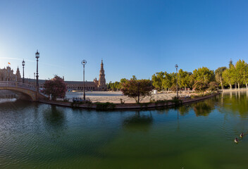Naklejka premium Seville, Spain, September 11, 2021: The Spanish Steps in Seville or 'Plaza de España', where the main building of the Ibero-American Exhibition of 1929 was built. The square of Plaza de Espana.