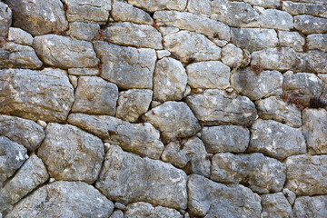 Polygonal masonry of stone wall of ancient Amos town in Turkey founded by the Dorians in the VII century BC