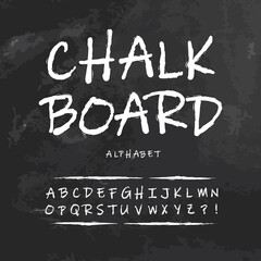 Fototapeta na wymiar Vector chalk style alphabet isolated letters on textured blackboard. ABC grunge design on shchool board. Hand driwind font. 