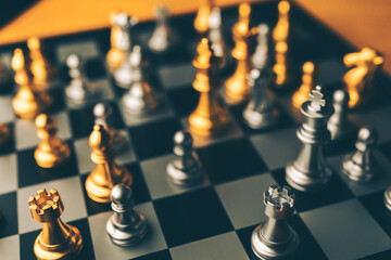 Chess board game to represent the business strategy with competition in the world market. and find...