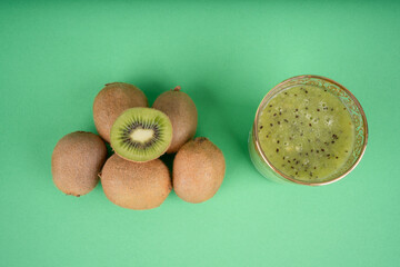 kiwi fruit on green background
