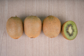 kiwi fruit on wooden background