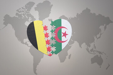 puzzle heart with the national flag of belgium and algeria on a world map background.Concept.