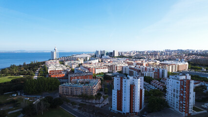 Lisbon, Portugal, April 24, 2022: DRONE AERIAL SHOT - The Vasco da Gama Tower and Myriad Hotel at Park of Nations in Lisbon. Modern residential neighborhood with contemporary architecture.