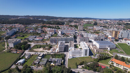 Fototapeta na wymiar Santo Tirso, Portugal - April 3, 2022: Aerial view - The Pavilhão Desportivo Municipal (Municipal Sports Pavilion) in Santo Tirso, Portugal.