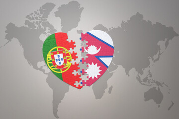 puzzle heart with the national flag of portugal and nepal on a world map background.Concept.