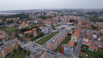 Vila Nova de Gaia, Portugal, May 21, 2022: Amazing panoramic view of Vila Nova de Gaia city with orange buildings.