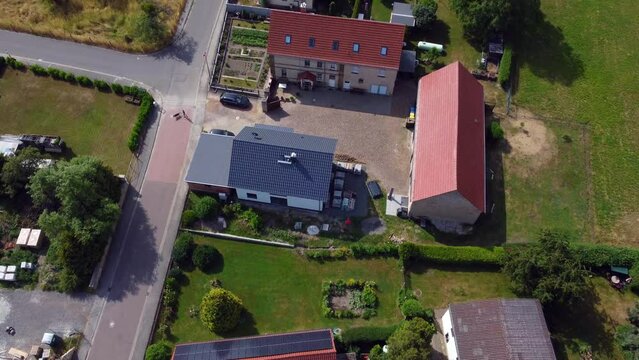Car turns at an intersection
Fantastic aerial view flight slowly tilt up drone footage at Countryside village Hainichen in Europe Saxony Anhalt, summer. 4k Cinematic view from above by Philipp Marnitz