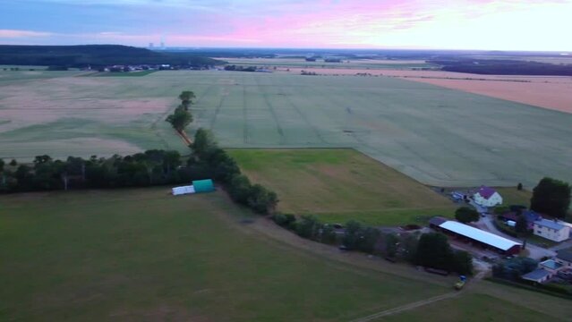 Evening atmosphere in Countryside village Hainichen.
Great aerial view flight 180 panorama overview drone footage in Europe Saxony Anhalt, summer 2022. 4k Cinematic view from above by Philipp Marnitz