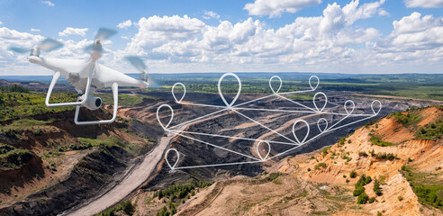 Innovation aerial uav drone copter flying with camera above opencast mining open coal. Concept...