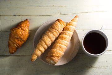 croissant and cup of coffee