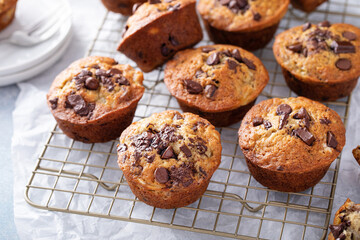 Banana chocolate chip muffins on a baking rack, breakfast or snack idea