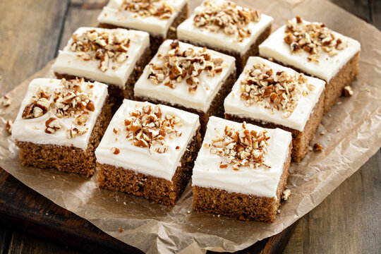 Carrot or pumpkin spiced cake with cream cheese frosting and pecan