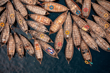 Aerial view of Wooden fishing boats along the Buriganga River, Keraniganj, Dhaka, Bangladesh.