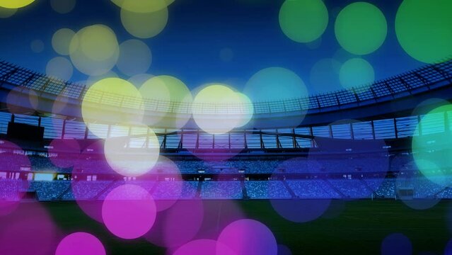 Animation of colorful dots over sport stadium