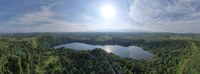 Aerial View of Lake Kyaninga at sunset and the forest, Kabarole, Uganda.