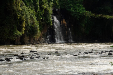 Waterfall of Piracicaba River. River almost dry. River with visible stones. River of a turistic place.