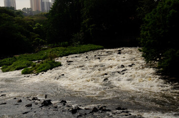 Waterfall of Piracicaba River. River almost dry. River with visible stones. River of a turistic place.