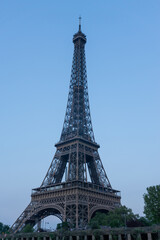 Part of the Eiffel Tower in Paris with the blue sky