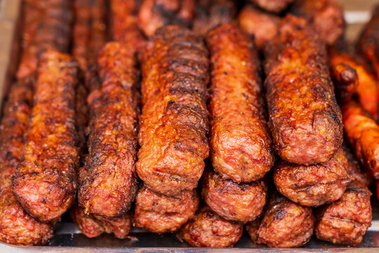 Close up of grilled lula kebab for sale at the international street food festival, selective focus