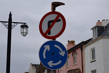 A roadsign on Sidmouth esplanade which shows a mini roundabout but with no right turn. This is...