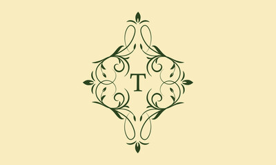 An elegant floral monogram template for one or two letters such as T. Exquisite calligraphic ornament. Business sign, monogram is identical for restaurant, boutique, cafe, hotel and other