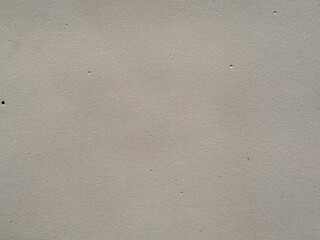 White textured surface for the background. The texture of white foam foam in close-up.