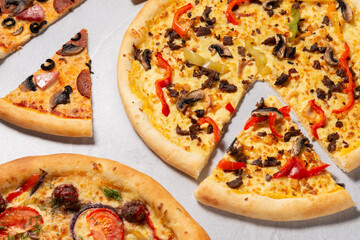 Tree types of italian pizza banner with free space for text, sliced pizza close up