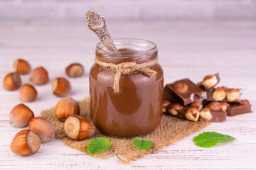 Chocolate spread with hazelnut flavor in a jar.