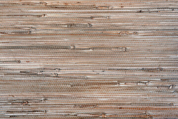 close up of the beige bamboo grass wicker wall background