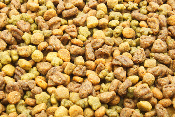 Dog or cat food, kibble on a white background