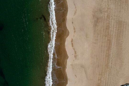 Aerial view of Playa de Comillas, Cantabria, Spain.