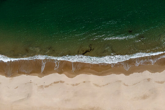 Aerial view of Playa de Comillas, Cantabria, Spain.