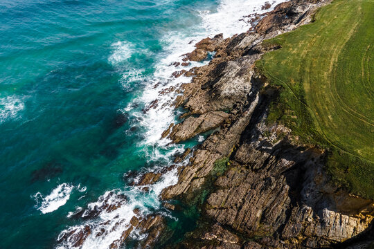Aerial view of wild coastline with cliffs near Playa de Serantes, Tapia de Casariego, Asturias, Spain.