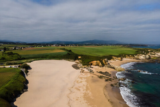 Aerial view of wild coastline with cliffs near Playa de Serantes, Tapia de Casariego, Asturias, Spain.
