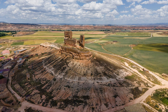 Aerial view of castle ruins on the rock in Montuega de Soria, Spain.