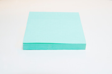Light blue notepad. Closeup of a notebook for noting tasks, thoughts, purchases. Concept for home and office.