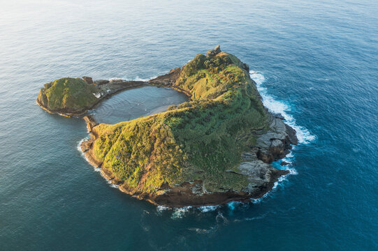 Aerial view of the small, volcanic island Vila Franco do Compa at sunrise, Sao Miguel, Azores, Portugal.
