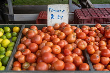 Tomato price on a white board at a street fair in Caxias do Sul, Brazil. Brazilian inflation.