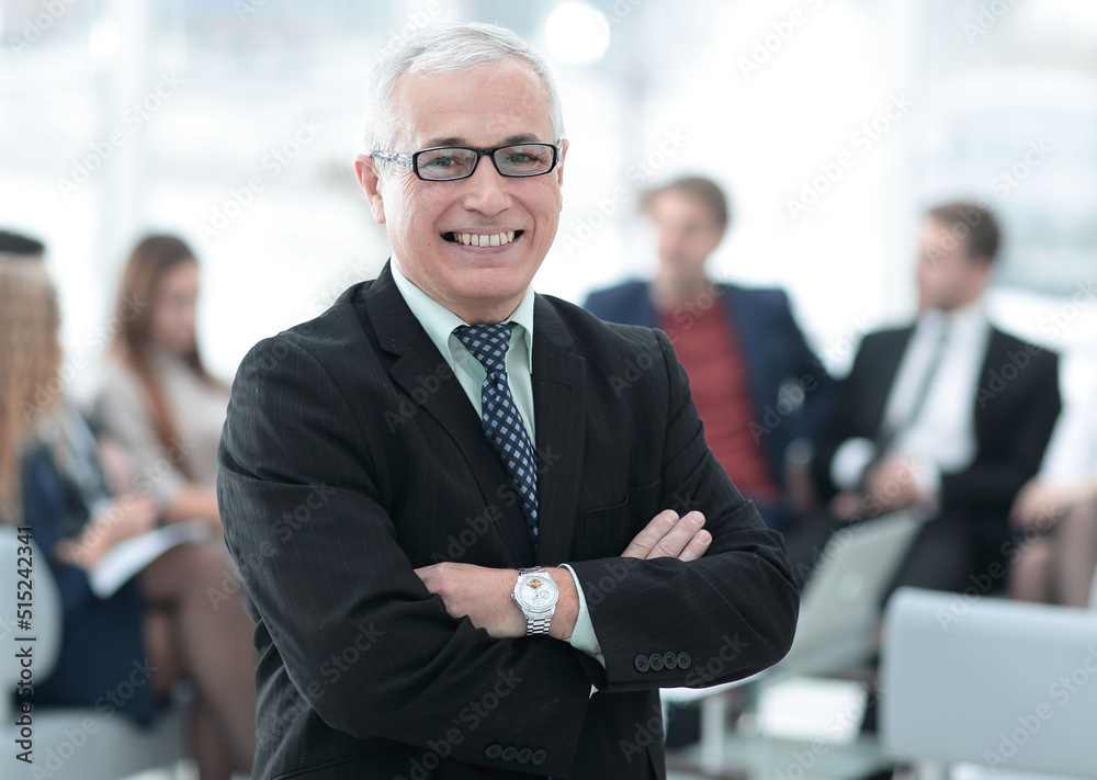 Canvas Prints smiling senior boss in the background of the office